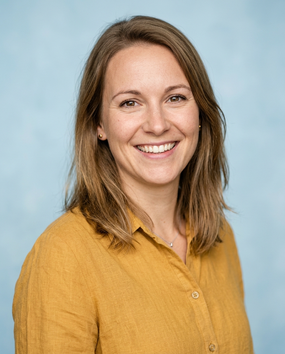 Generated example of a teacher headshot cropped to the square profile format, eyes in the upper third